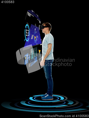 Image of happy man in virtual reality headset or 3d glasses