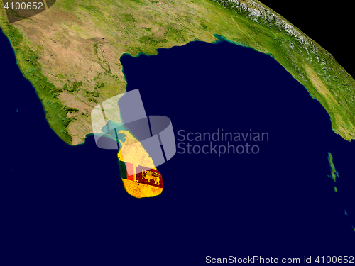 Image of Sri Lanka with flag on Earth