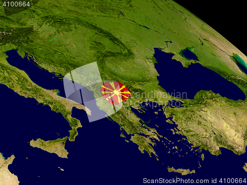 Image of Macedonia with flag on Earth