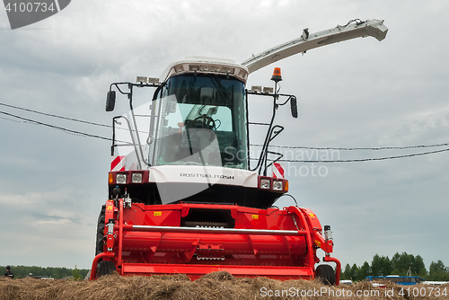 Image of New harvester stands on an exhibition platform
