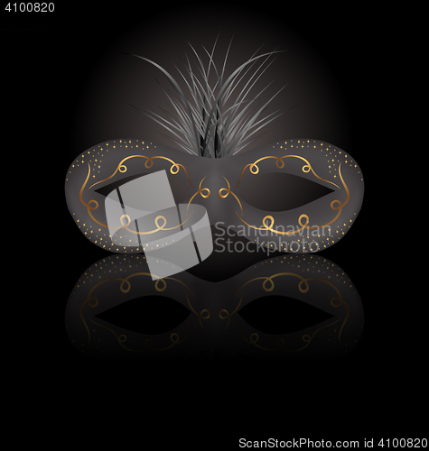 Image of Theater or Carnival mask with reflection on black background