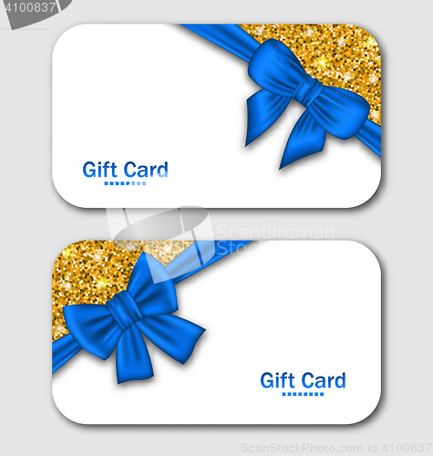 Image of  Gift Cards with Blue Bow Ribbon and Golden Surface