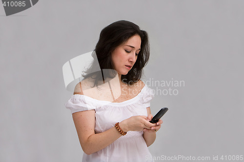 Image of Woman texting