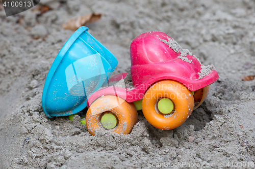 Image of Children\'s machine in the sand