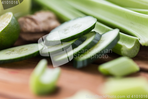 Image of close up of celery stems and sliced cucumber