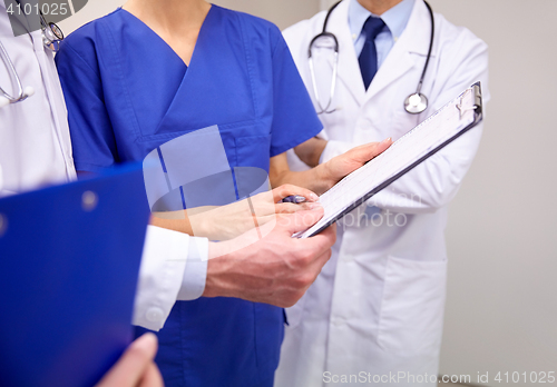 Image of close up of doctors with clipboard at hospital