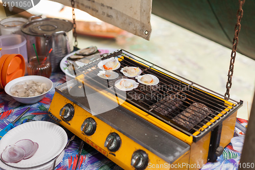 Image of Thai Oysters grilling