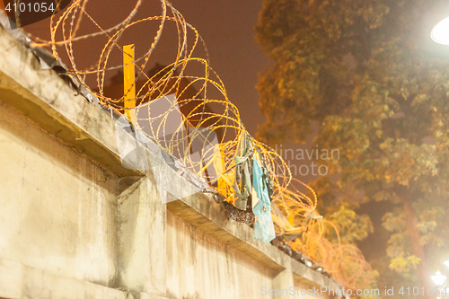 Image of Wall with barbed wire