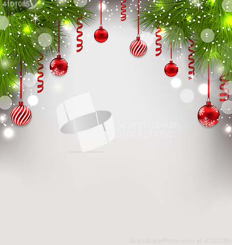 Image of Christmas glowing background with fir branches, glass balls, str
