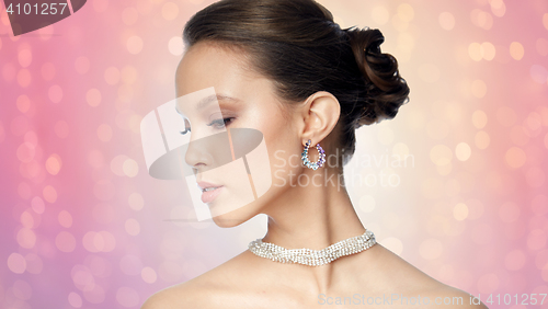 Image of close up of beautiful woman face with earring