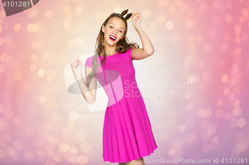 Image of happy young woman or teen girl in princess crown