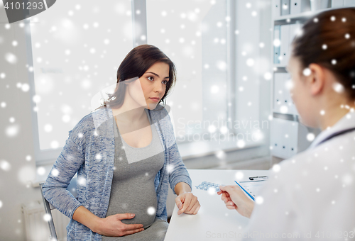 Image of gynecologist doctor and pregnant woman at hospital