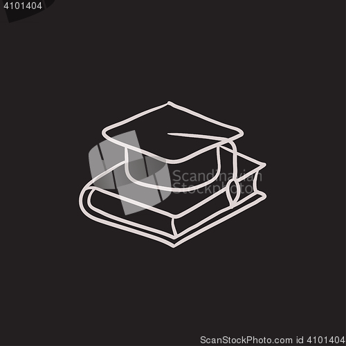 Image of Graduation cap laying on book sketch icon.