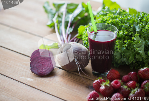 Image of glass of beetroot juice, fruits and vegetables