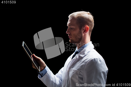 Image of male doctor or scientist with tablet pc