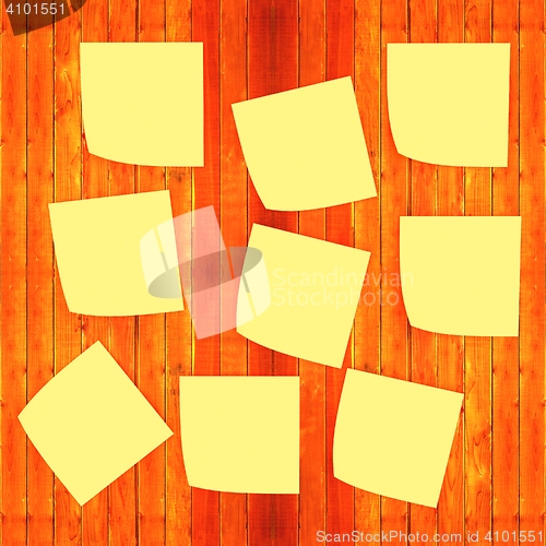 Image of Mock-up of Sticky note paper on a wooden wall. 3D illustration