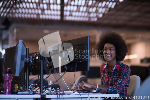 Image of portrait of a young successful African-American woman in modern 