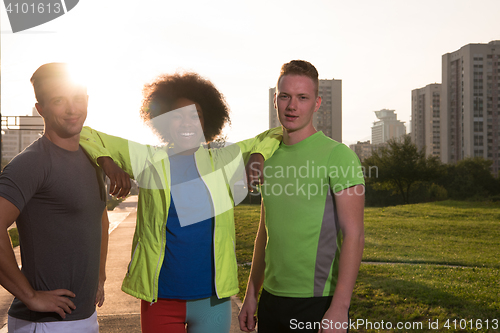 Image of portrait multiethnic group of people on the jogging