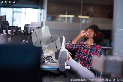 Image of portrait of a young successful African-American woman in modern 