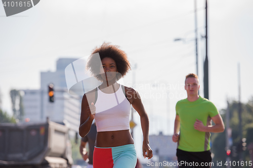 Image of multiethnic group of people on the jogging