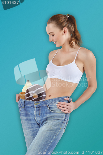 Image of Woman became skinny and wearing old jeans