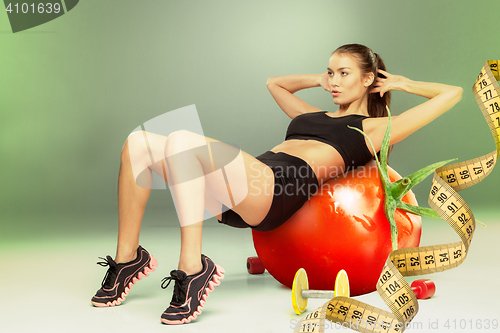 Image of Sporty woman doing aerobic exercise