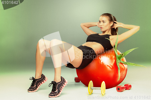 Image of Sporty woman doing aerobic exercise