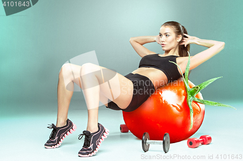 Image of Sporty woman doing aerobic exercise