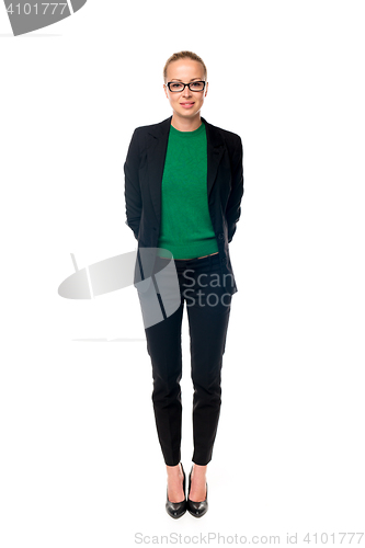 Image of Business woman standing with arms crossed against white background..