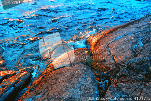 Image of Waves Splashing About Granite Coast