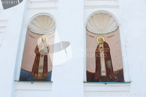 Image of images of two Saints on the Triytskyi temple wall
