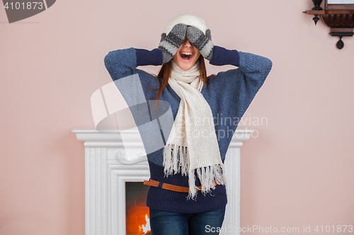 Image of Girl near fireplace