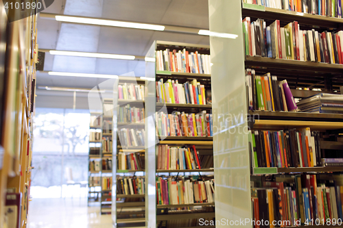 Image of bookshelves with books at school library