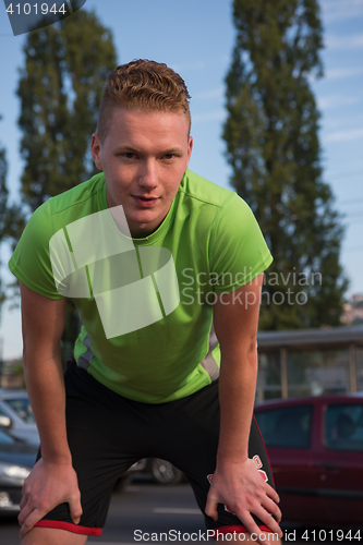 Image of portrait of a young man on jogging