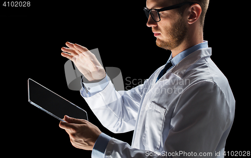 Image of close up of doctor or scientist with tablet pc