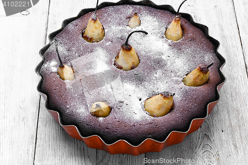 Image of Pear pie in baking dish