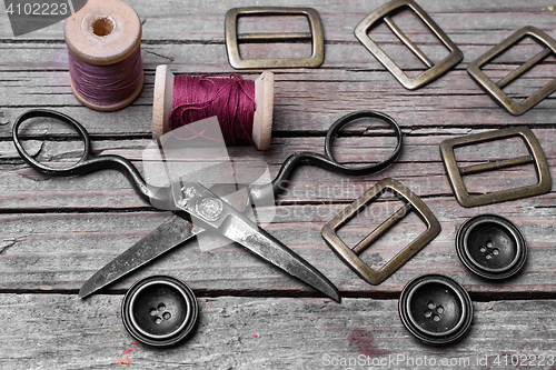 Image of Retro set of buttons,thread and scissors
