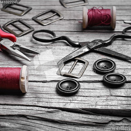 Image of Retro set of buttons,thread and scissors