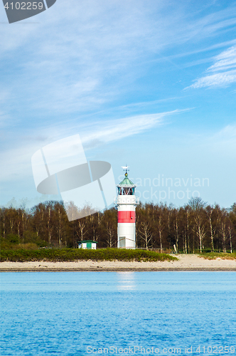 Image of Lighthouse at a blue lake
