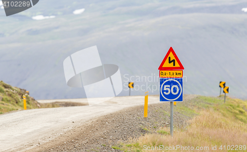 Image of Curve with advisory speed limit