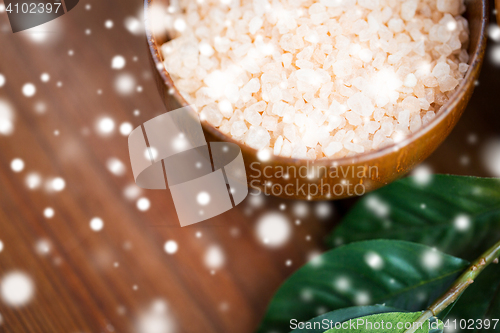 Image of close up of himalayan pink salt in wooden bowl