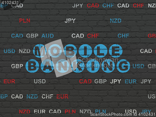 Image of Currency concept: Mobile Banking on wall background