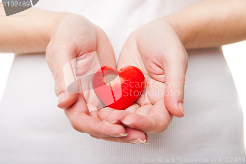 Image of Woman\'s hand with heart symbol isolated