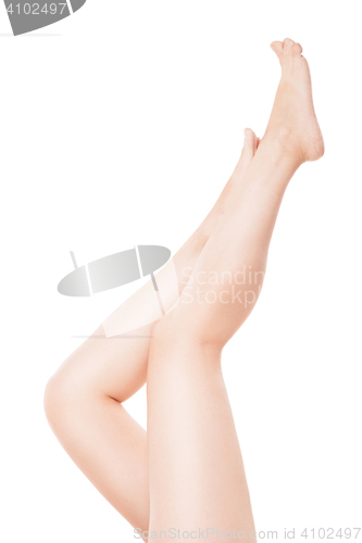 Image of Beautiful woman legs isolated over white