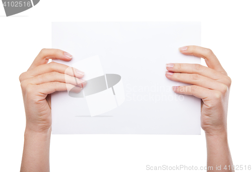 Image of hand holding blank paper isolated 