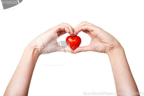 Image of Woman\'s hand with heart symbol isolated