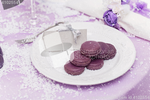 Image of Purple macarons on plate