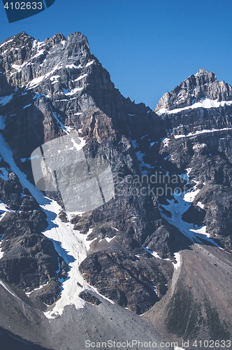 Image of Rough mountain with cliffs and snow