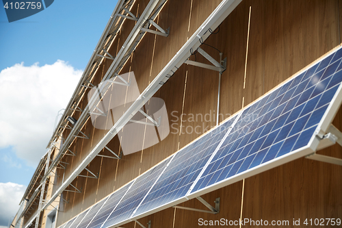 Image of solar battery panels on building facade