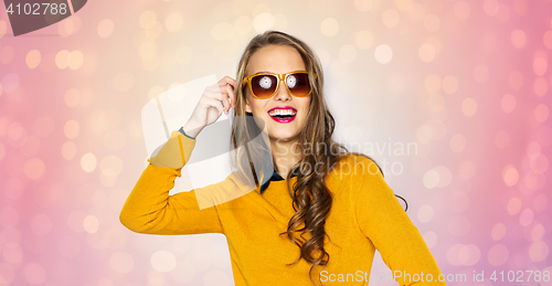 Image of happy young woman or teen girl in casual clothes